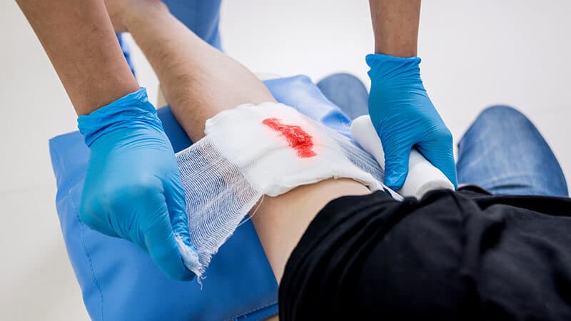 injured-person Injured person being attended to by a nurse