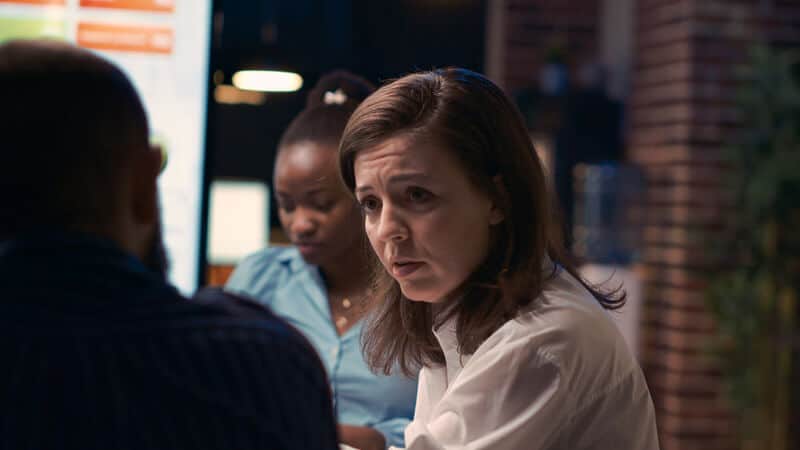 workplace-bullying-meeting People in a meeting addressing workplace bullying