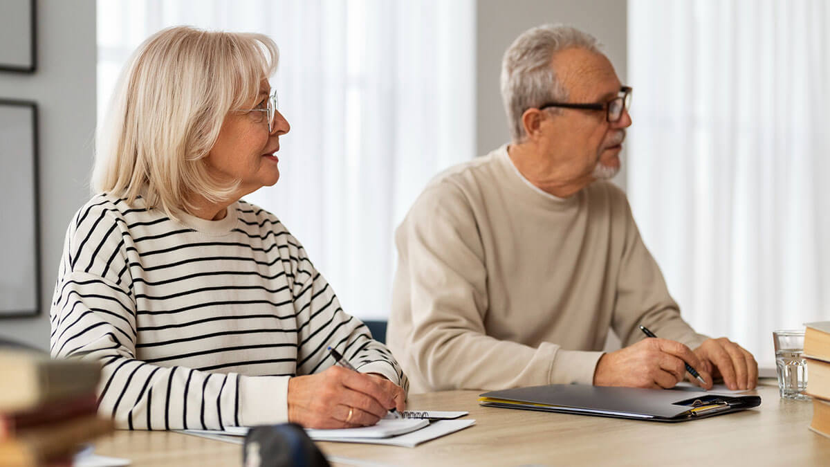 willblogfeb26 Senior couple at a wills & probate meeting