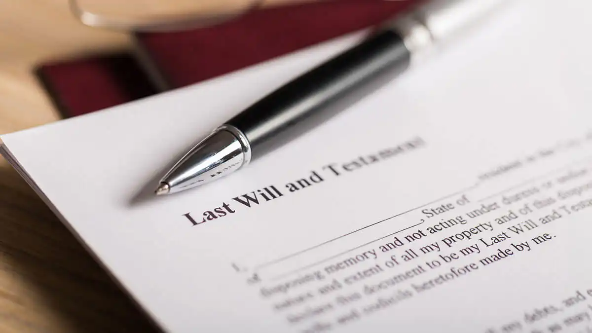 will-and-testament Pen adjacent to a will and testament document