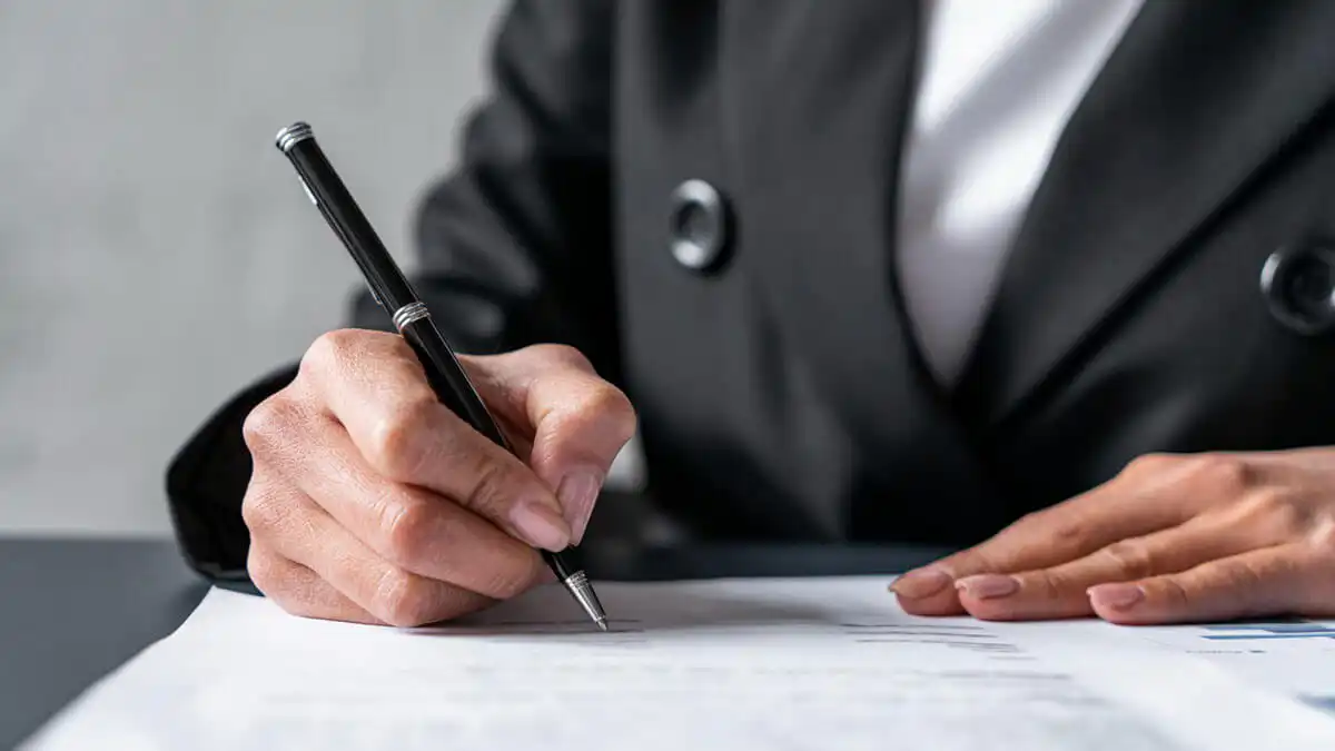will-sign-blog-jun26 Person signing a will